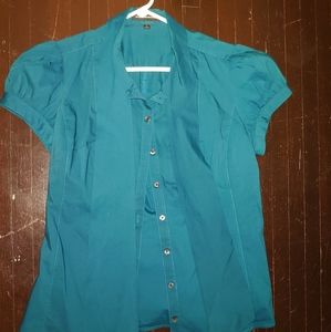 Turquoise cravat blouse.